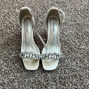 London Rebel 2 strap white heels with gems. Fits like a 7.5. Worn 2x.
